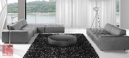 2-3 seat sofa with backs adjustable horizontally. Seat base with capitoné