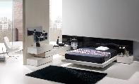 room bed bedside table comode armchair carpet